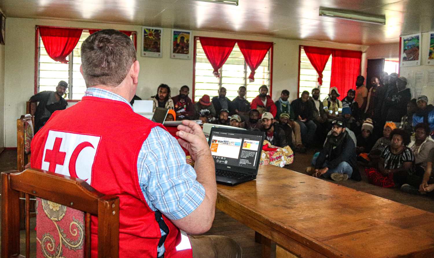 Dallas giving a talk to Papua New Guinea Red Cross members