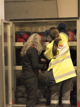 Dunedin team members Tracey Cuthbertson (L) and Ciara White assist during Dunedin floods in October 2024