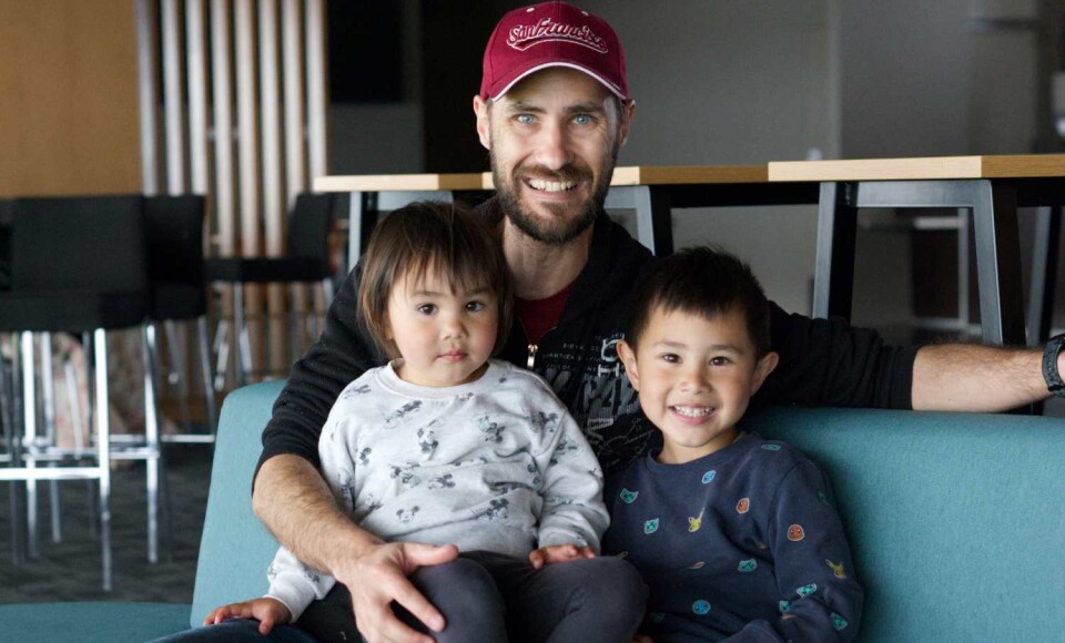 Mark Willis with his children during Dunedin flooding October 2024