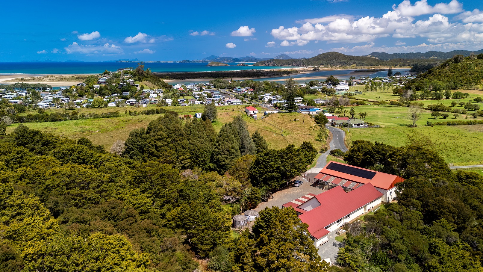 An aerial shot looking down on Ngunguru Marae and surrounding areas.