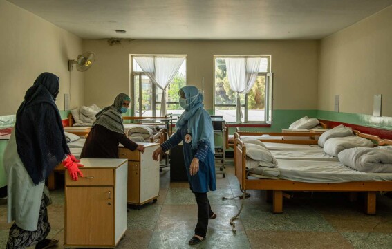 International Delegate Gail Corbett and AFRS nurses setting up a Covid-19 ward in Kabul