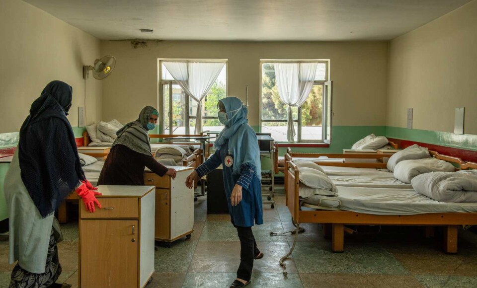 International Delegate Gail Corbett and AFRS nurses setting up a Covid-19 ward in Kabul